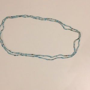 Long blue beaded necklace